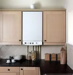 Kitchen Design With Boiler And Sofa