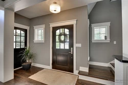 Dark Floor And Light Doors In The Interior Photo Of The Apartment