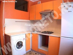 Kitchen design with geyser and washing machine
