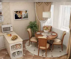 Photo interior of a small kitchen with a round table