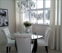 Photo interior of a small kitchen with a round table