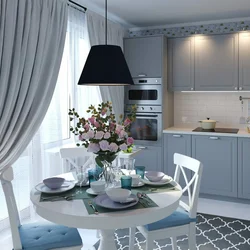 Дөңгелек үстелі бар шағын асүйдің фото интерьері