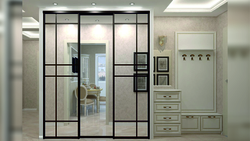 Beautiful sliding wardrobes in the hallway in a modern style photo