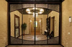 Beautiful sliding wardrobes in the hallway in a modern style photo