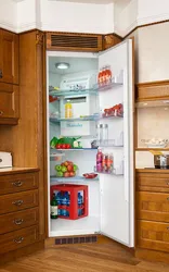 Refrigerator in the corner of the kitchen photo in the interior