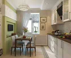 Interior of a rectangular kitchen with a balcony