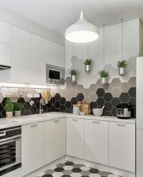 Tiles and wallpaper on one wall kitchen photo