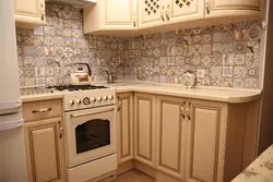 Tiles and wallpaper on one wall kitchen photo