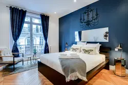 Blue and beige in the bedroom interior photo