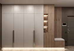 Built-in wardrobe in the hallway with hinged doors modern design photo