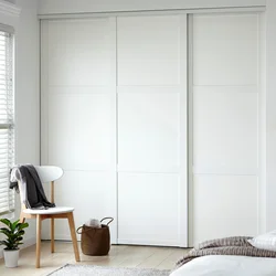 Bedroom wardrobes white color photo