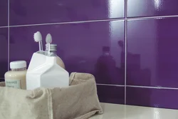 Photo of a bathtub with grout matching the color of the tiles