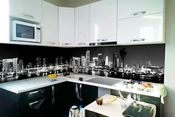 Kitchen interior with black and white apron photo