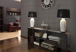 Apartment interiors with dark furniture