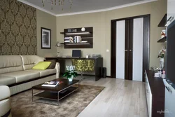 Apartment interiors with dark furniture