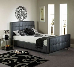 Bedroom interior with gray bed