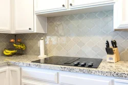 Tiles Behind Slabs In The Kitchen Photo