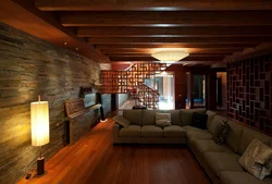 Living room with stone and wood photo