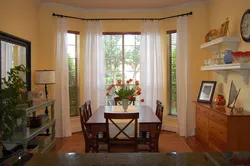 Cornices for the living room in the interior of the apartment photo