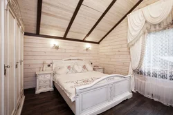 Modern bedroom design for a wooden house