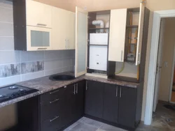 Kitchen design with one window and boiler