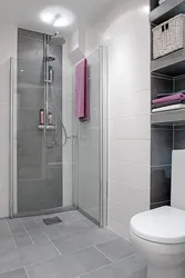 Bathtub with shower design in gray tones