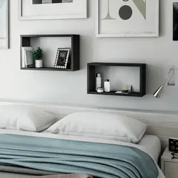 Shelves above the bed in the bedroom interior