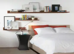 Shelves Above The Bed In The Bedroom Interior