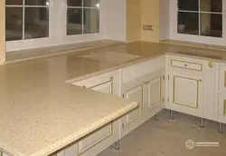 Countertop for the kitchen in the interior photo which is better