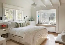 Bedroom design with furniture by the window