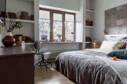 Bedroom design with furniture by the window