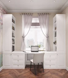 Bedroom design with furniture by the window