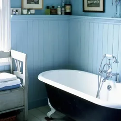 Bath design made of plastic panels and tiles