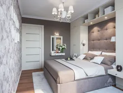 Bedroom design with a window and a balcony on one wall