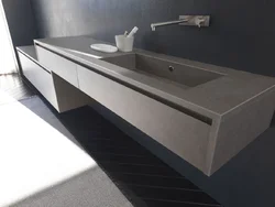 Countertop In The Bathroom Under The Sink Made Of Porcelain Stoneware Photo