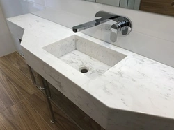 Countertop In The Bathroom Under The Sink Made Of Porcelain Stoneware Photo