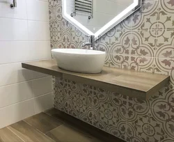 Countertop in the bathroom under the sink made of porcelain stoneware photo
