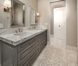 Countertop in the bathroom under the sink made of porcelain stoneware photo