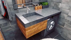Countertop in the bathroom under the sink made of porcelain stoneware photo