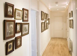 Paintings in a small hallway interior
