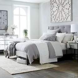 Bedroom design with light gray bed