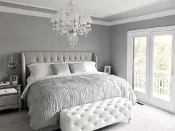 Bedroom design with light gray bed