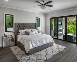 Bedroom with gray bed design photo