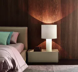 Lamps on the bedside table in the bedroom photo