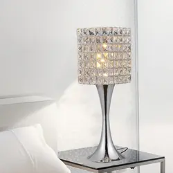 Lamps on the bedside table in the bedroom photo