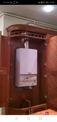 Еденде газ қазандығы бар ас үй интерьері