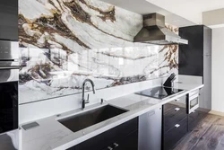 Kitchen With Marble Countertop And Splashback Photo