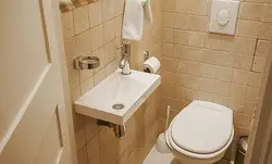 Photo of a bathroom with one toilet