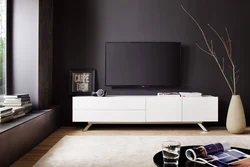 Bedside tables in the living room for TV in a modern style photo