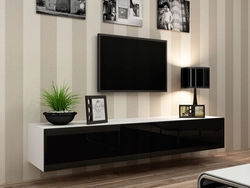 Bedside tables in the living room for TV in a modern style photo